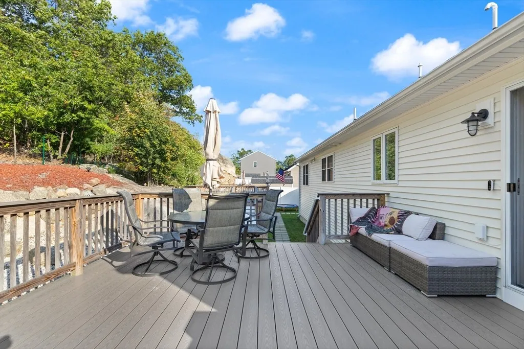 Spacious backyard deck with seating