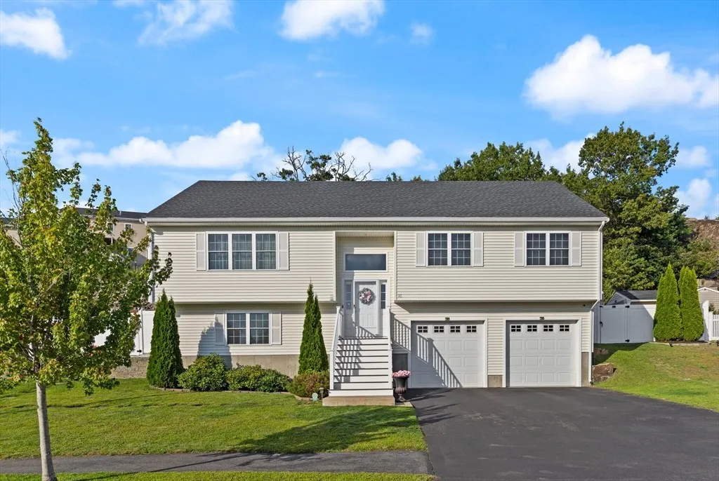 Beautiful front view with landscaped yard